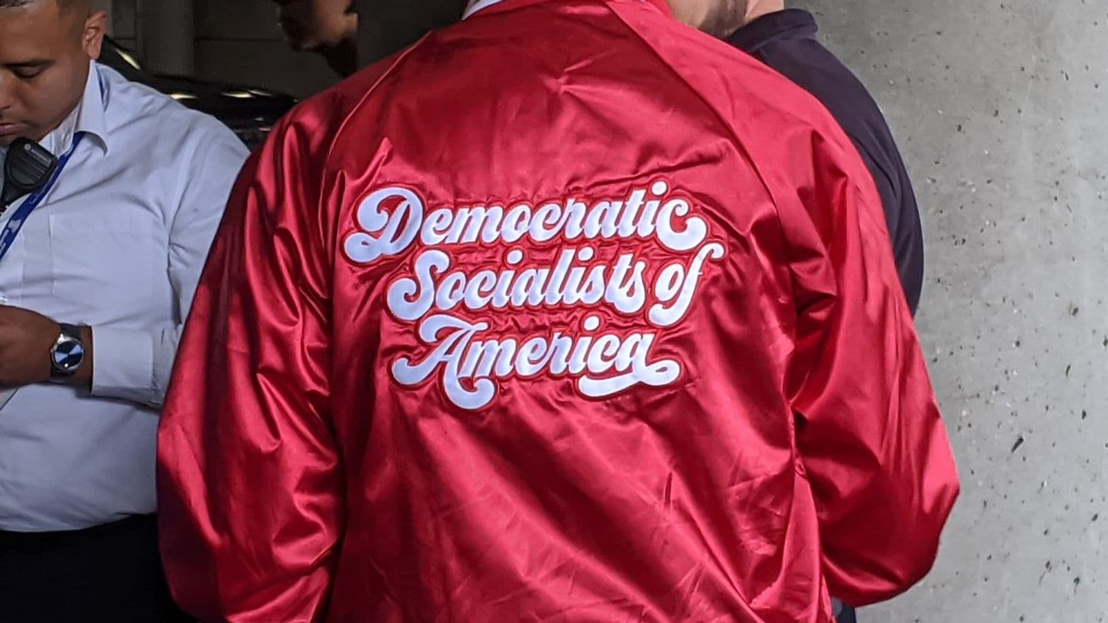 Democratic Socialists of America jacket at a Bernie Sanders rally,