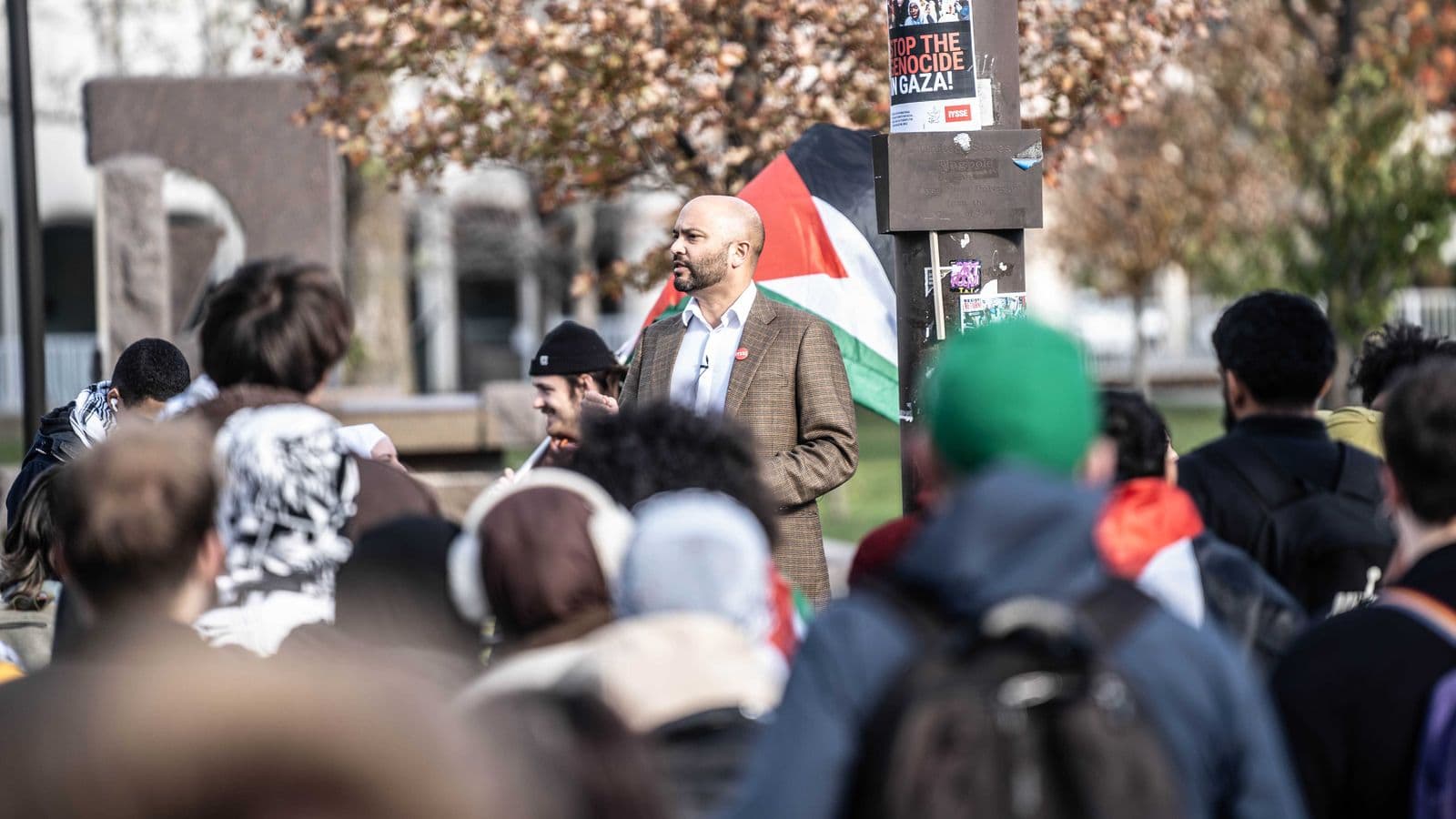 Joseph Kishore speaks at Thursday's rally at Wayne State University.